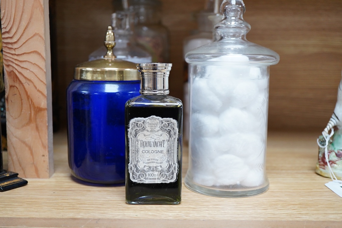 A collection of glass vessels to include Royal Yacht Cologne, three 19th century drug jars etc, (9).